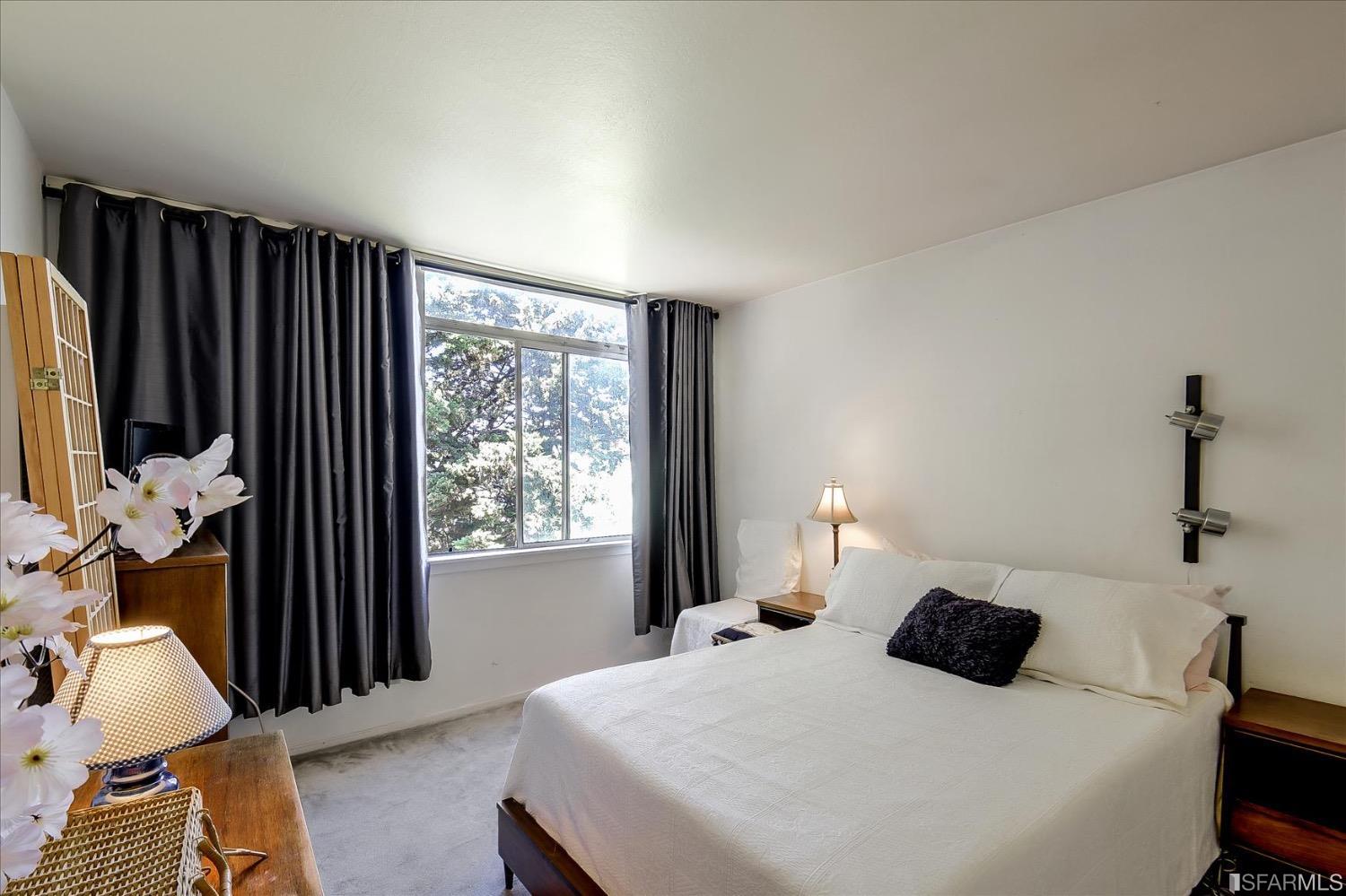 50 Inca Lane, Unit 5 San Francisco, CA 94115 - Photo 23 of 33 a bedroom with a bed and a window