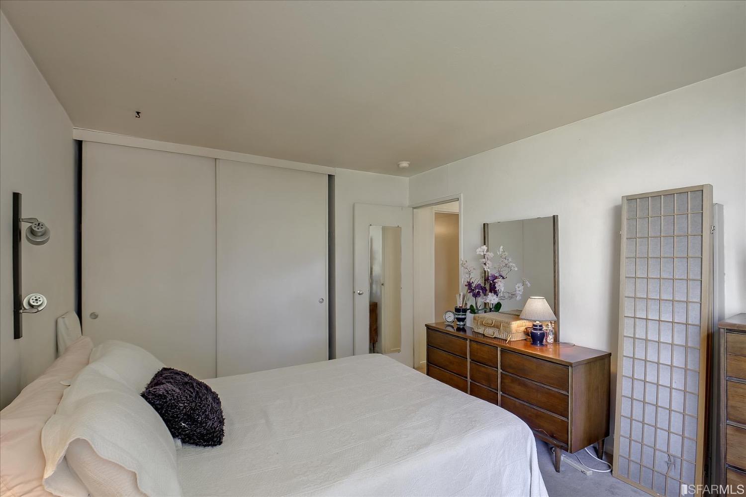 50 Inca Lane, Unit 5 San Francisco, CA 94115 - Photo 25 of 33 a bedroom with a bed and dresser