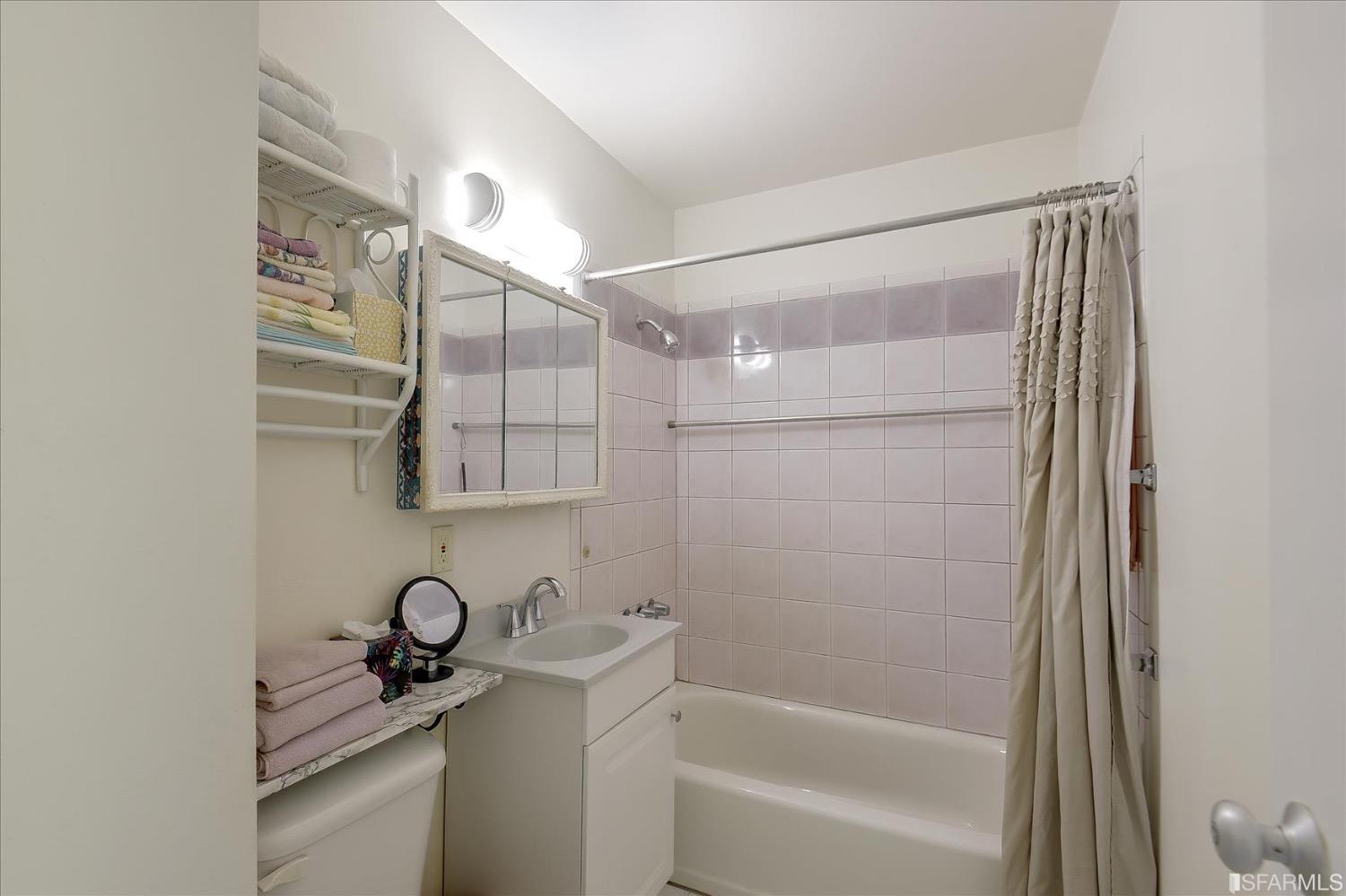 50 Inca Lane, Unit 5 San Francisco, CA 94115 - Photo 27 of 33 a bathroom with a shower and a sink