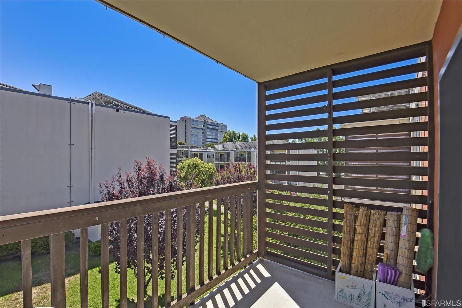 50 Inca Lane, Unit 5 San Francisco, CA 94115 - Photo 30 of 33 a view of a balcony with wooden floor and fence