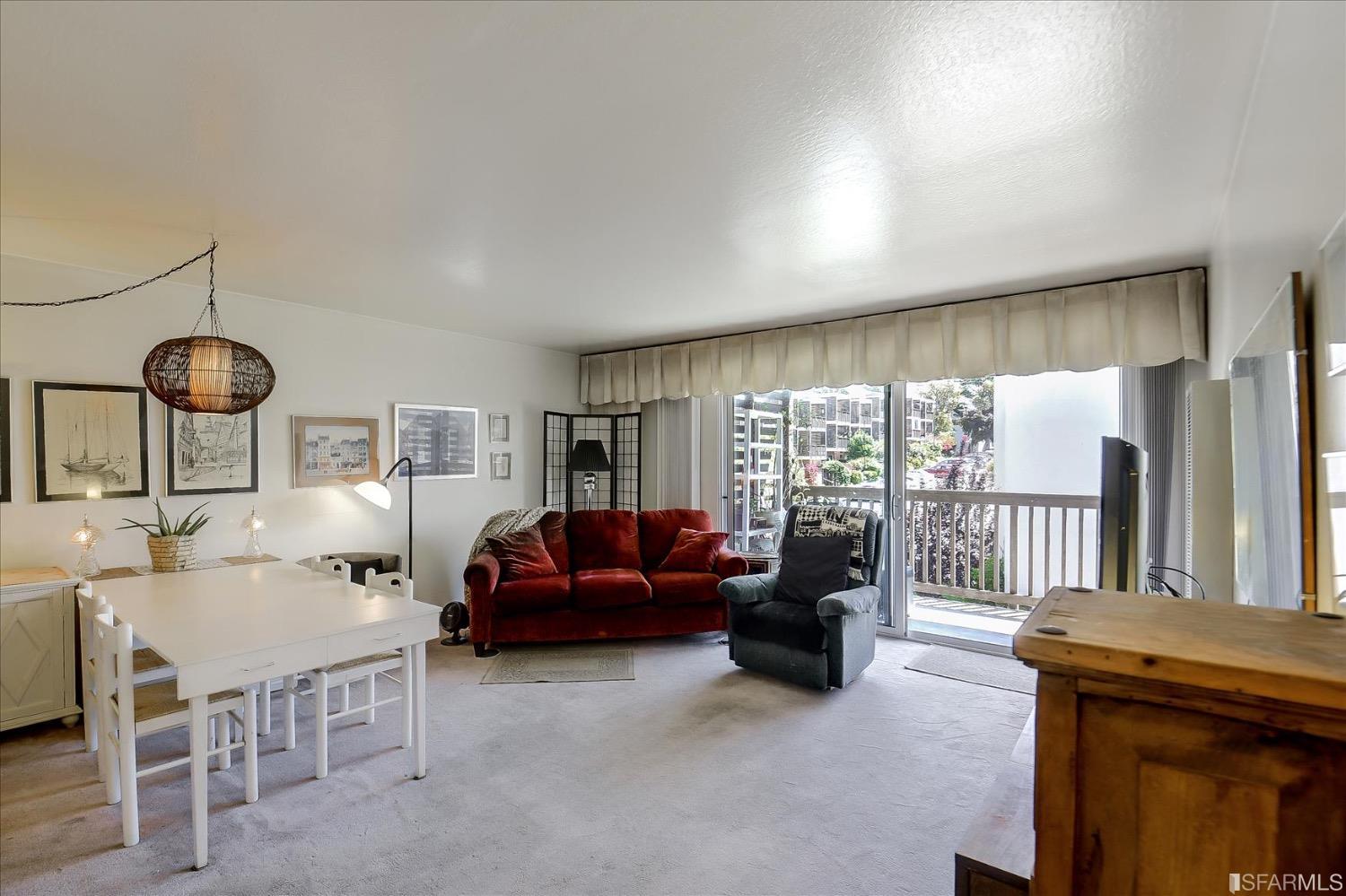 50 Inca Lane, Unit 5 San Francisco, CA 94115 - Photo 10 of 33 a living room with furniture and a large window