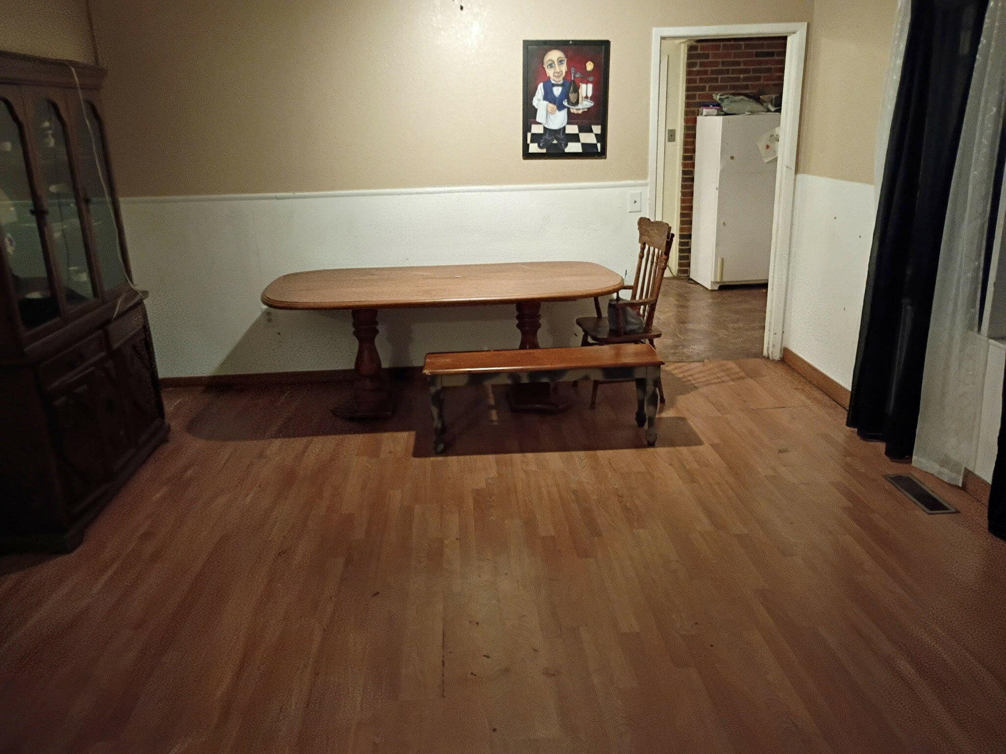 2304 48th Street Lubbock, TX 79412 - Photo 2 of 5 a living room with furniture and a flat screen tv