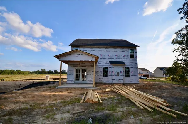 a view of a swimming pool with an outdoor seating