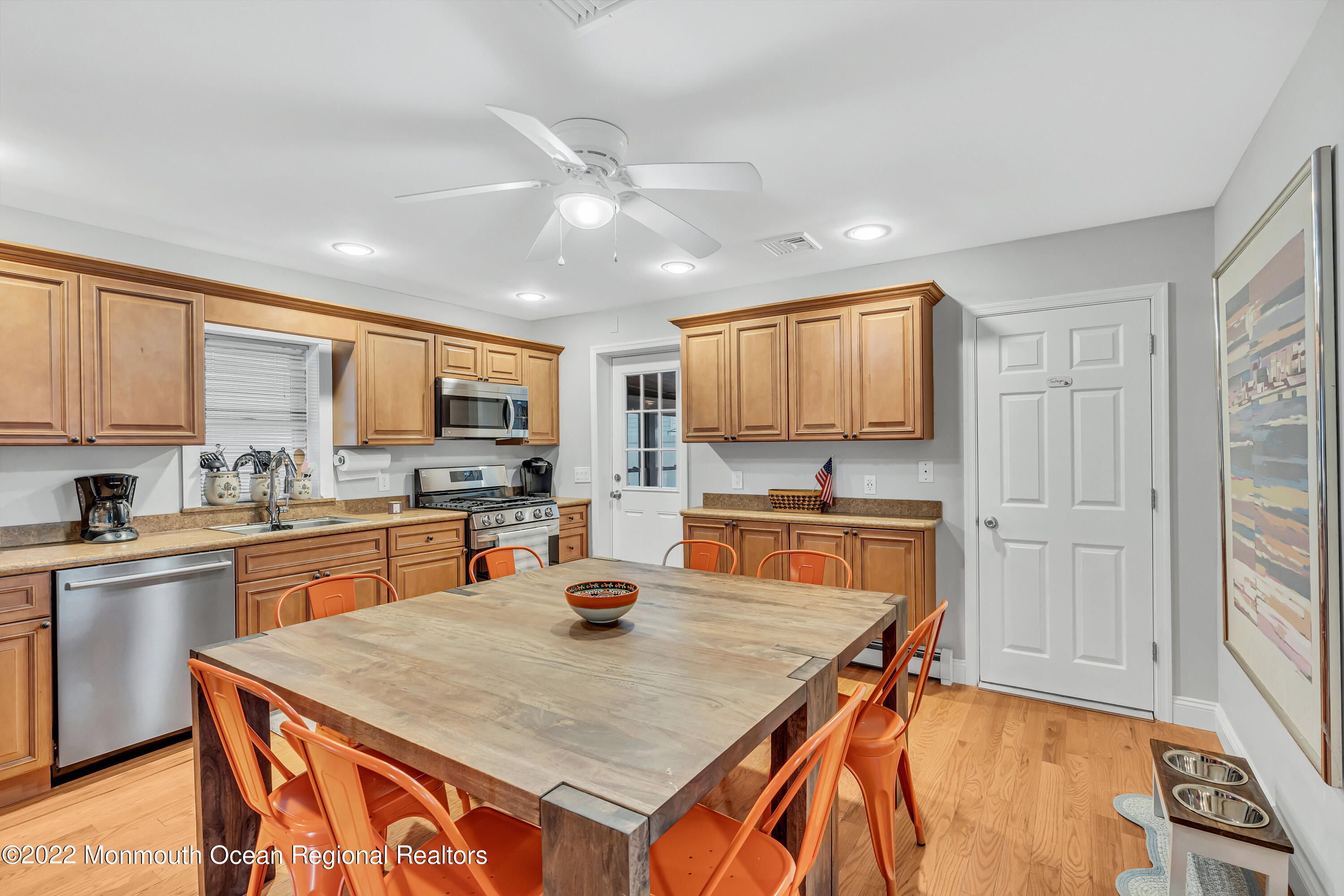 57 Fielder Avenue Seaside Heights, NJ 08751 - Photo 14 of 31 a kitchen with stainless steel appliances granite countertop a sink stove and refrigerator