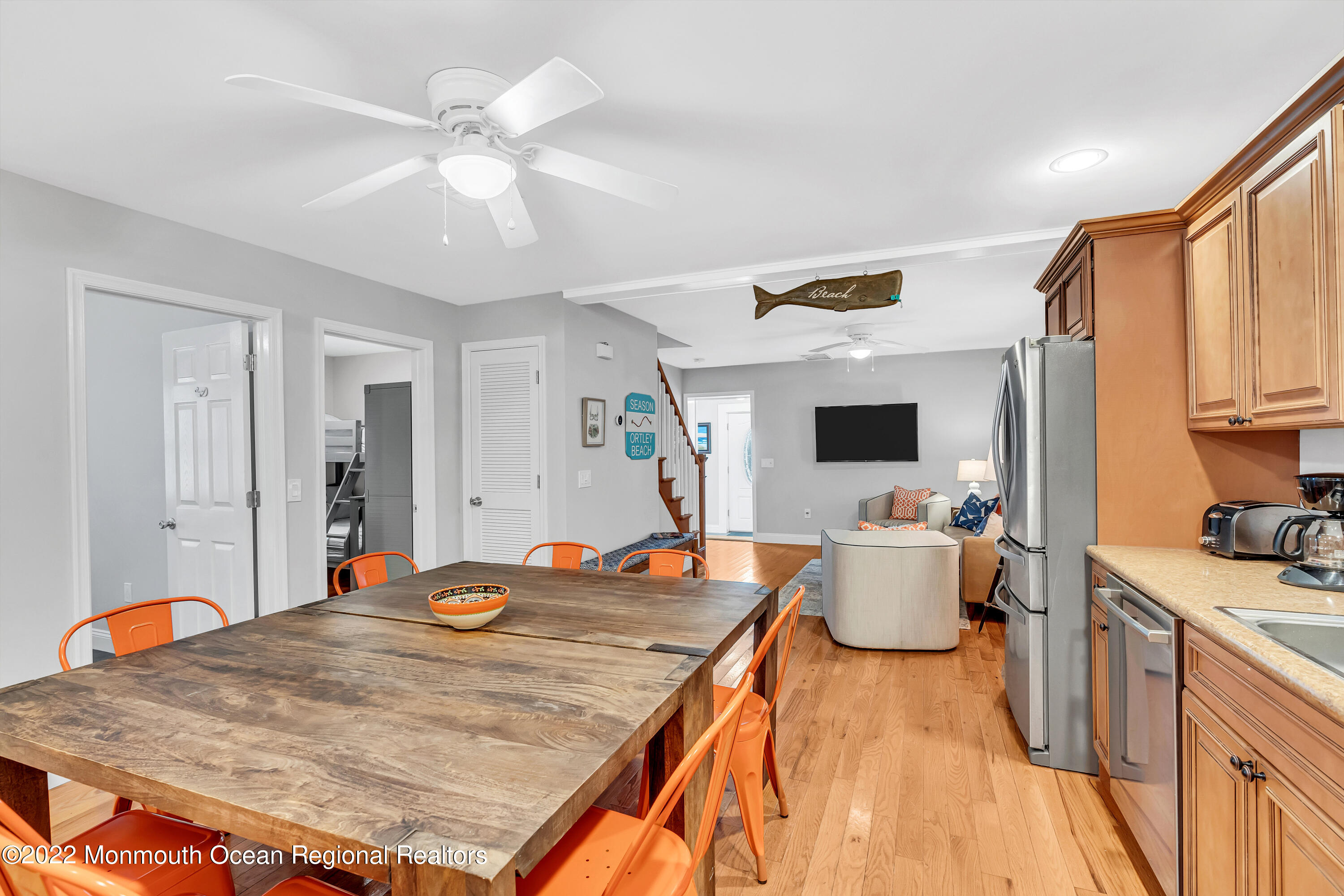 57 Fielder Avenue Seaside Heights, NJ 08751 - Photo 16 of 31 a bed room with a bed and a kitchen