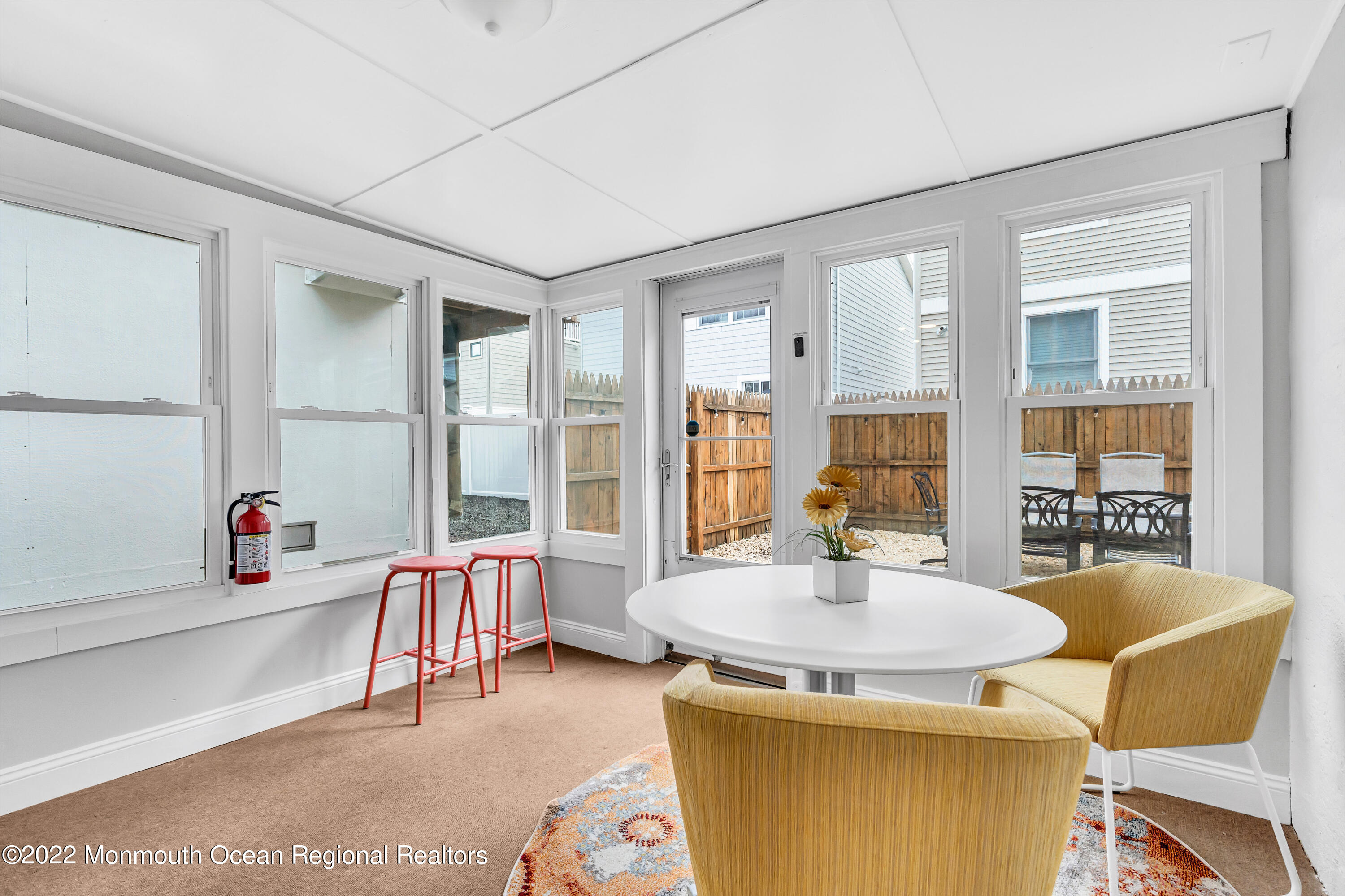57 Fielder Avenue Seaside Heights, NJ 08751 - Photo 21 of 31 a dining room with a table and chairs