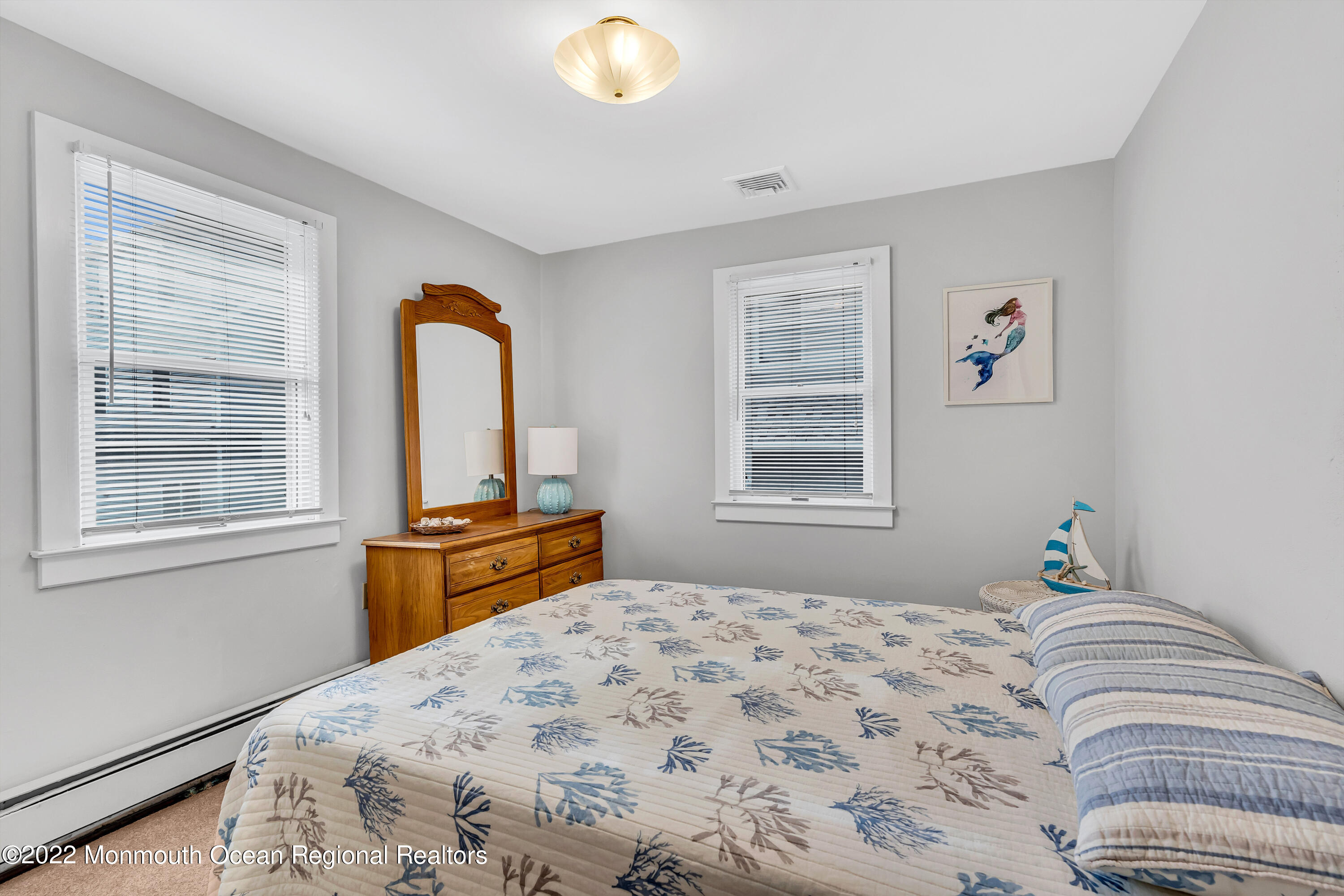 57 Fielder Avenue Seaside Heights, NJ 08751 - Photo 24 of 31 a bedroom with a bed and a window