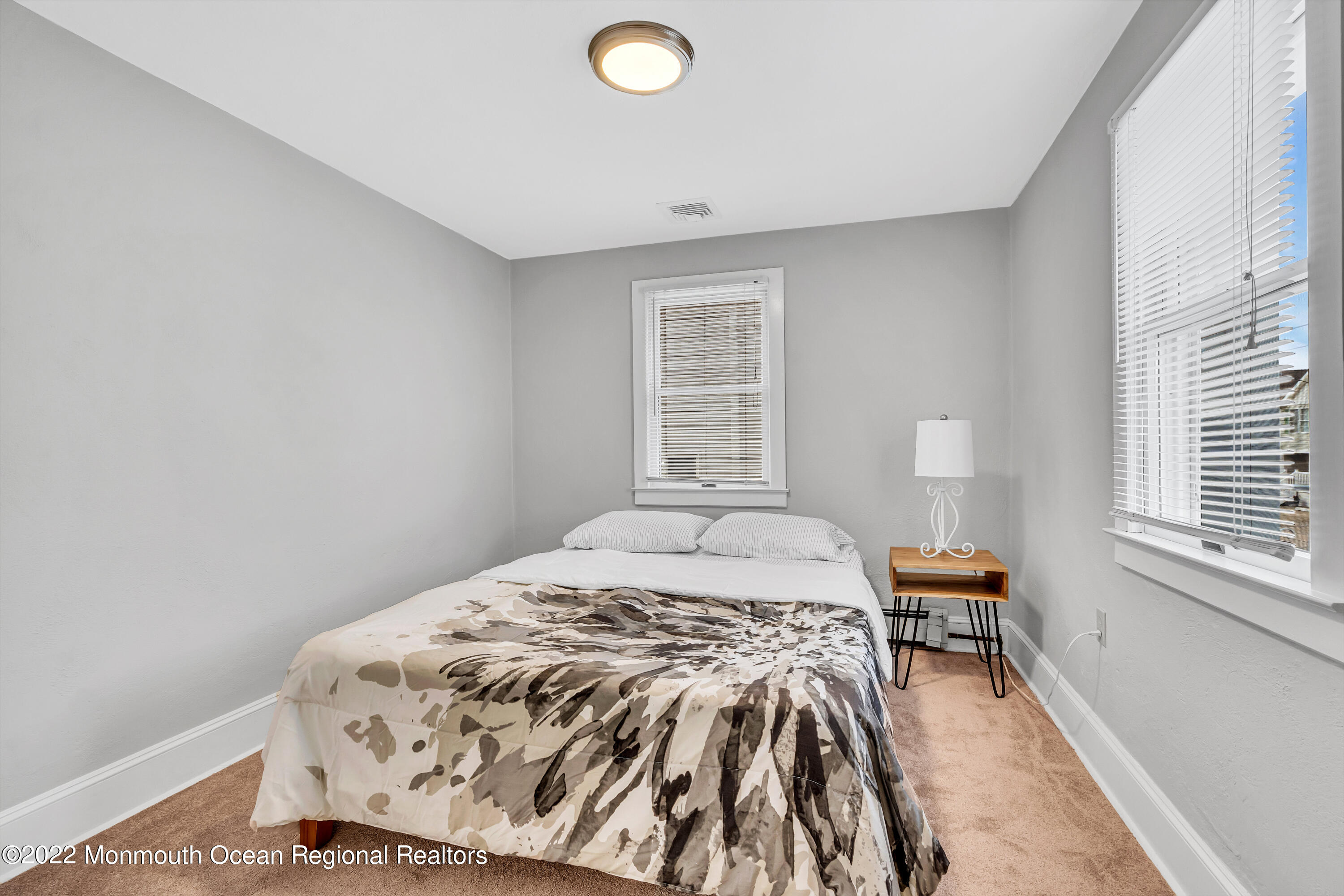 57 Fielder Avenue Seaside Heights, NJ 08751 - Photo 28 of 31 a bedroom with a bed and a window