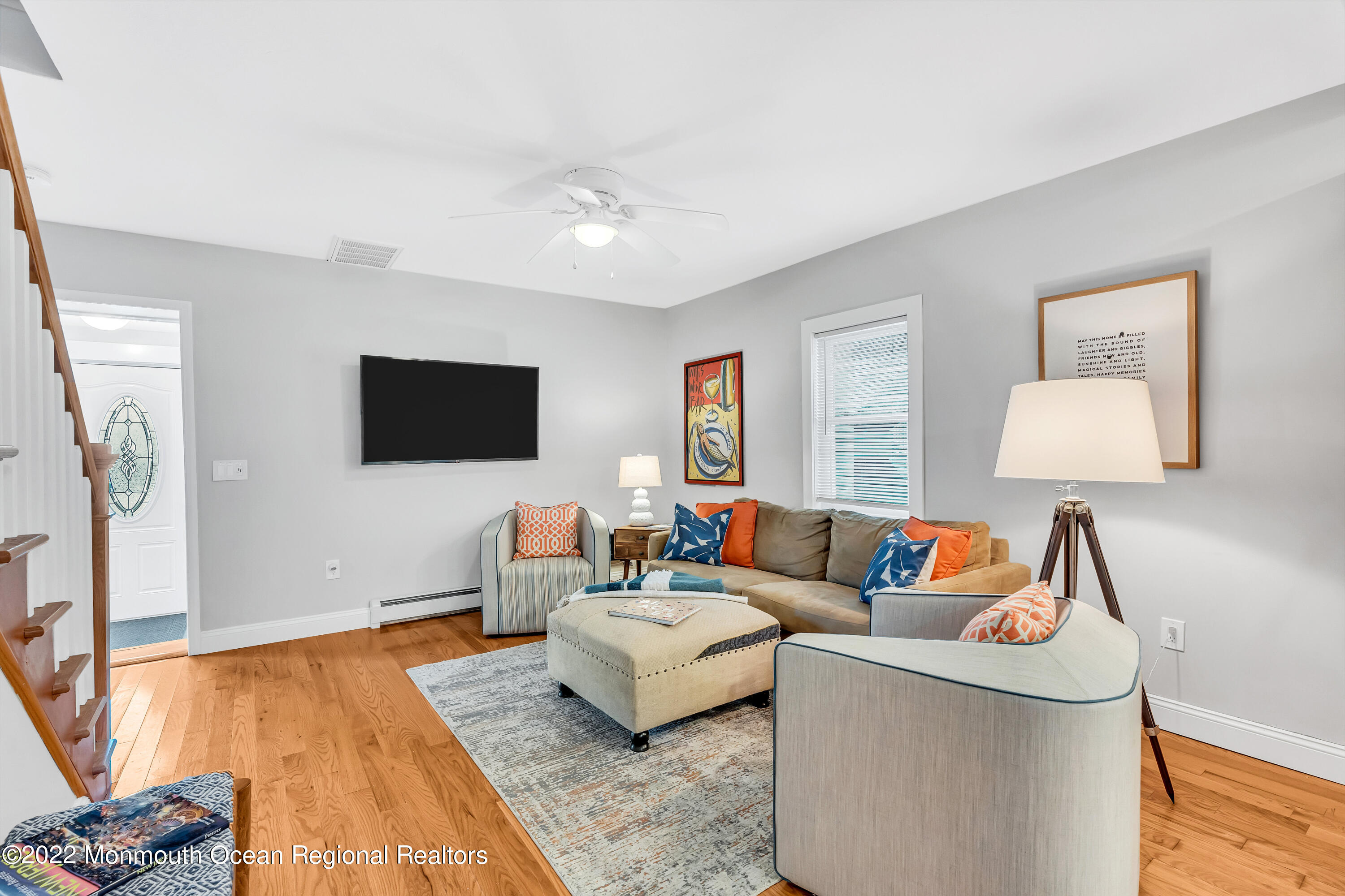 57 Fielder Avenue Seaside Heights, NJ 08751 - Photo 4 of 31 a living room with furniture and a flat screen tv