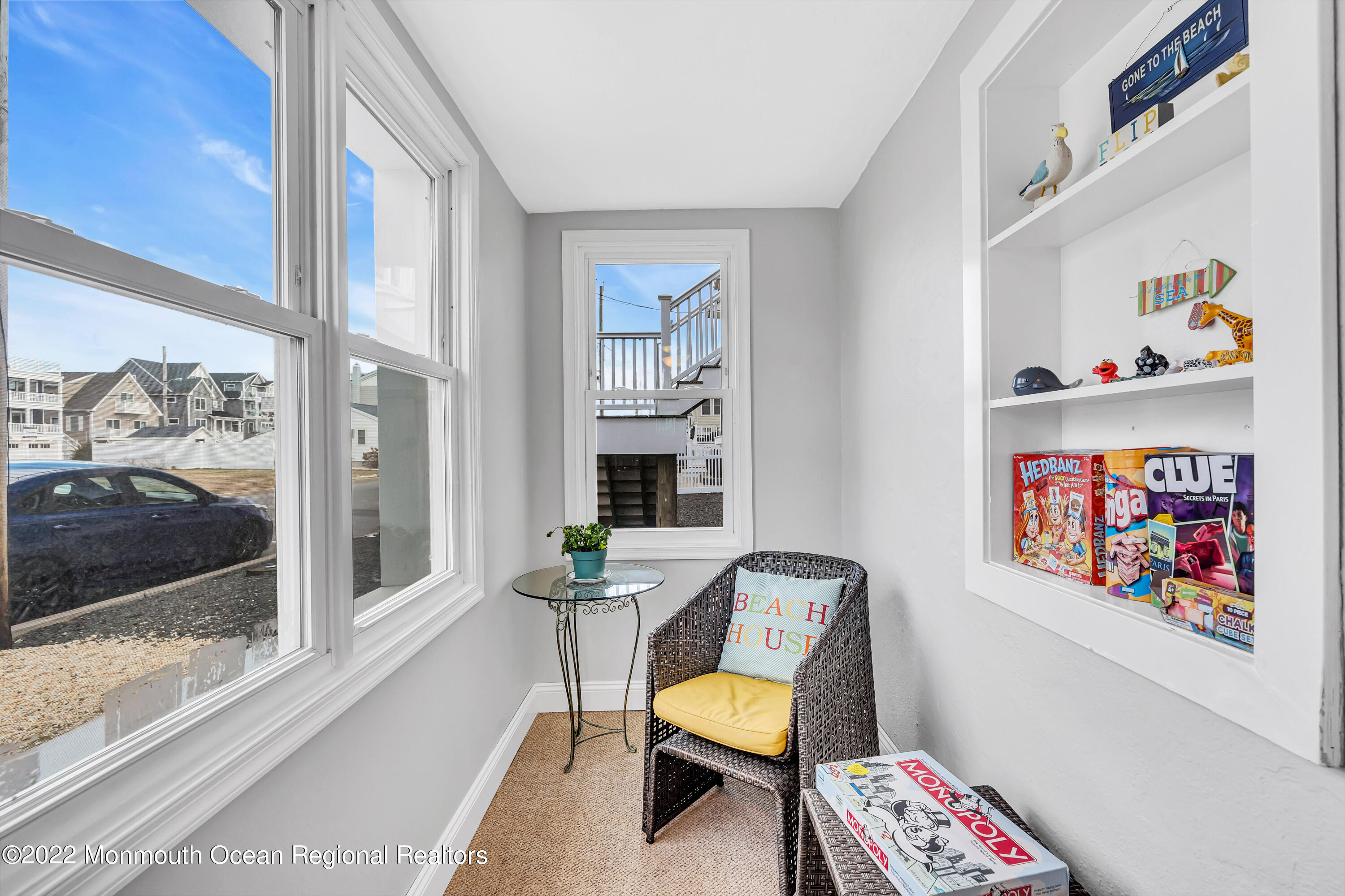 57 Fielder Avenue Seaside Heights, NJ 08751 - Photo 9 of 31 a living room with furniture and a floor to ceiling window