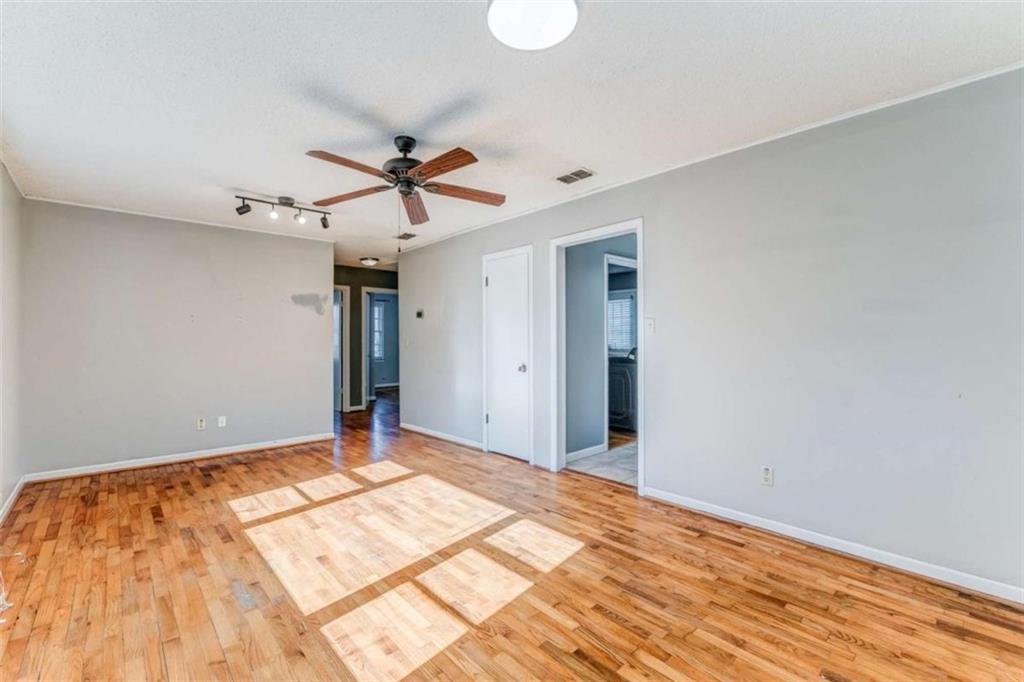 1407 East 2nd Avenue Southeast Rome, GA 30161 - Photo 19 of 28 a view of a room with a ceiling fan