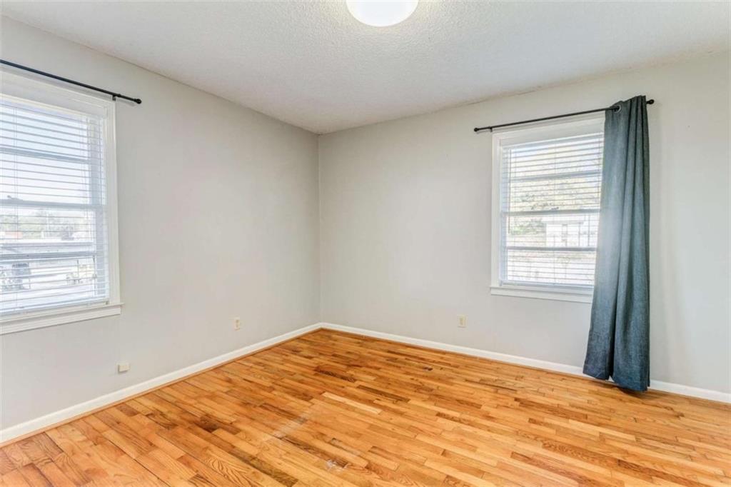 1407 East 2nd Avenue Southeast Rome, GA 30161 - Photo 7 of 28 a view of empty room with wooden floor