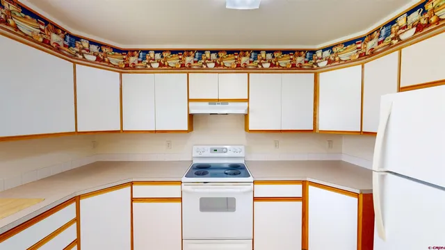 a kitchen with a sink and a window