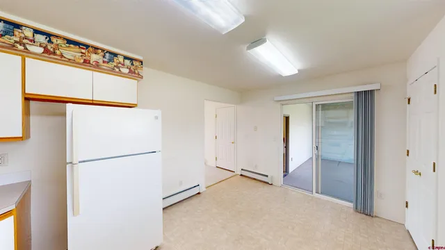 a view of entryway with wooden fence