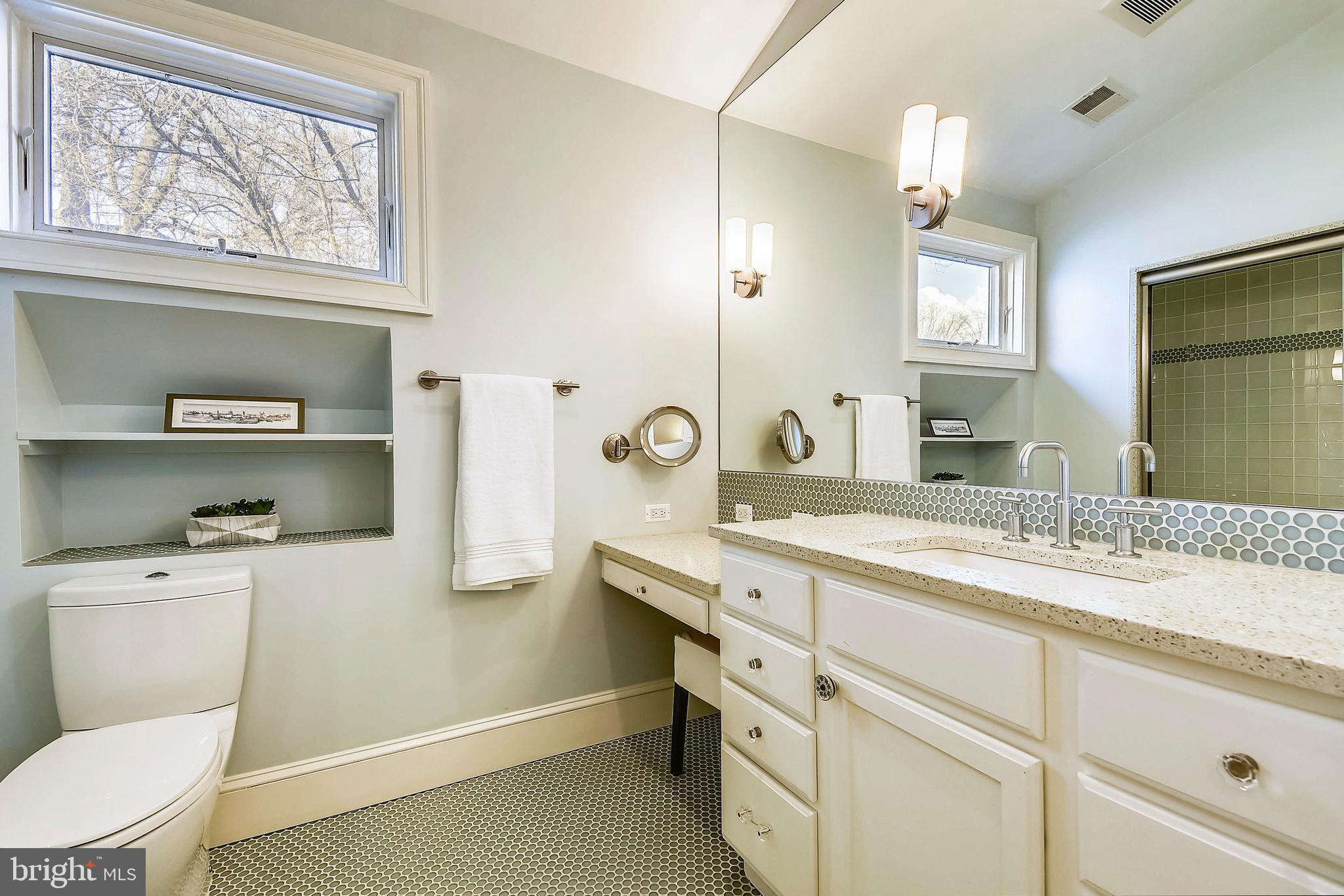 5510 Lambeth Road Bethesda, MD 20814 - Photo 33 of 53 Hall bath with glass tile, custom vanity