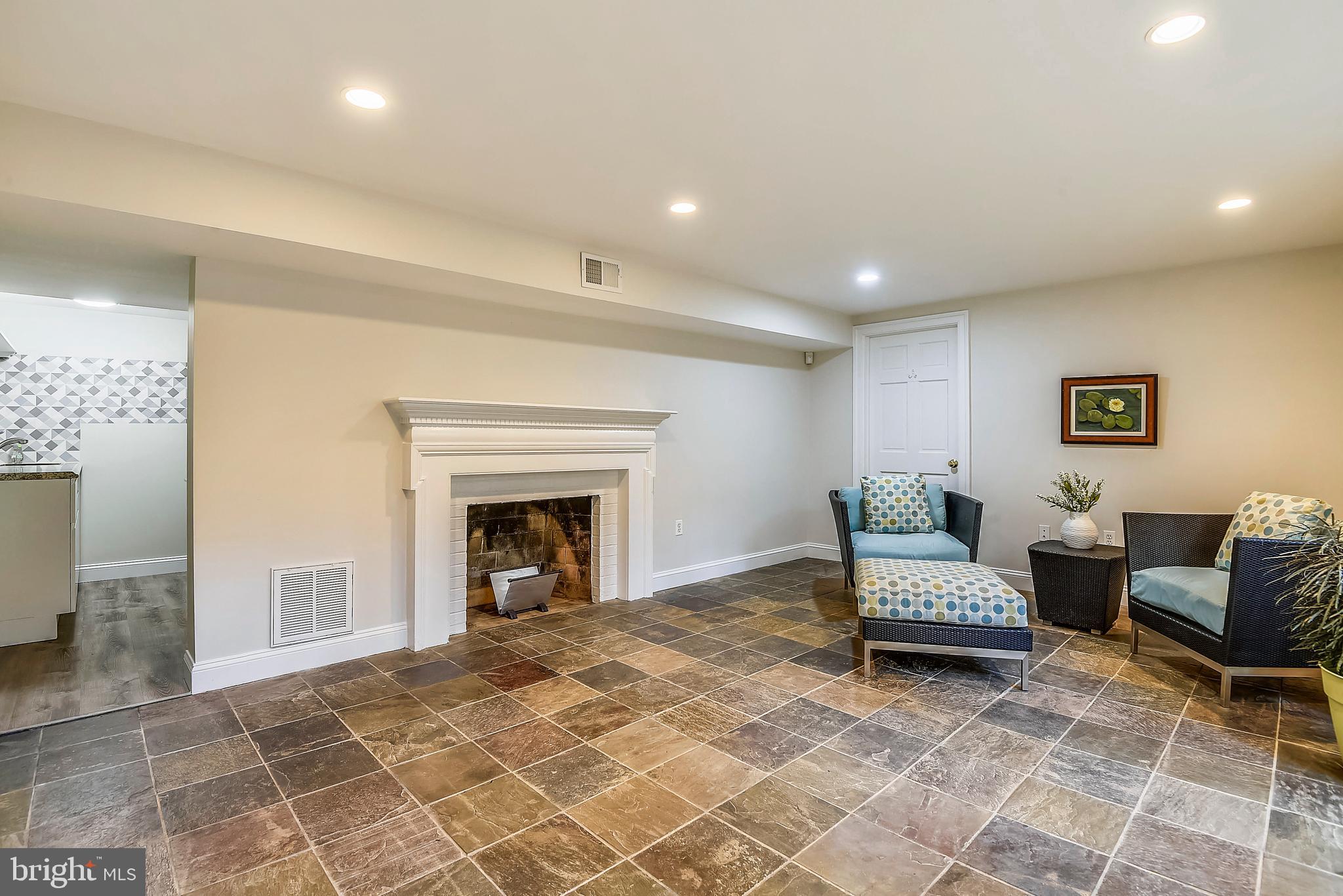 5510 Lambeth Road Bethesda, MD 20814 - Photo 38 of 53 Family Room with fireplace, adjacent kitchenette