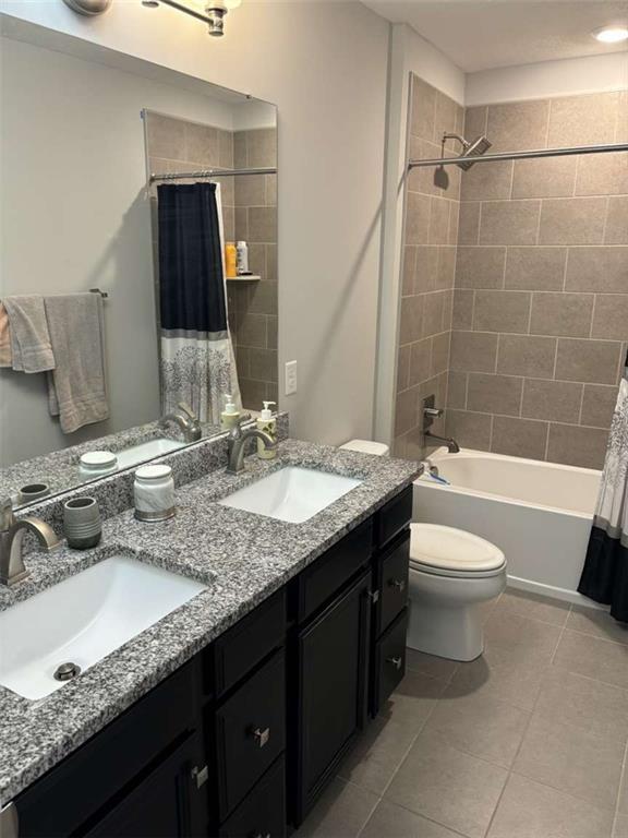 102 Cole Drive McKees Rocks, PA 15136 - Photo 19 of 25 a bathroom with a granite countertop sink toilet and shower