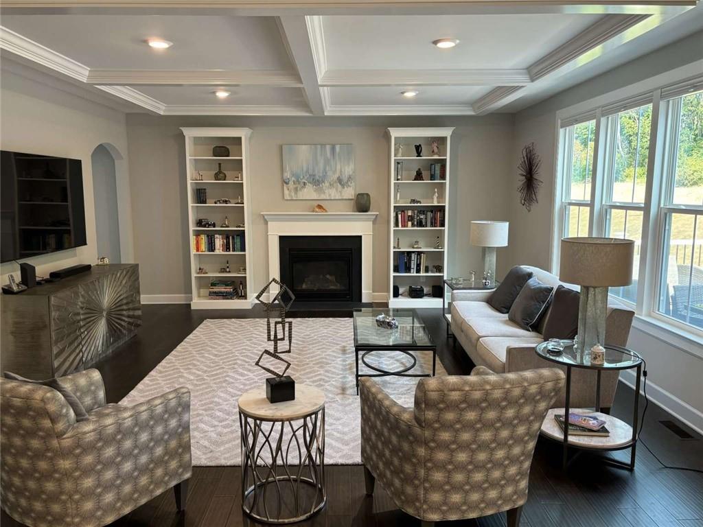 102 Cole Drive McKees Rocks, PA 15136 - Photo 2 of 25 a living room with furniture a flat screen tv and a fireplace