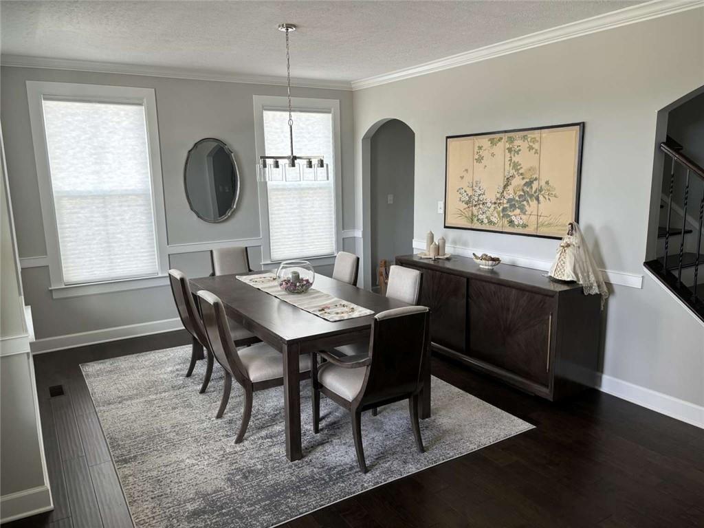 102 Cole Drive McKees Rocks, PA 15136 - Photo 10 of 25 a view of a dining room with furniture and wooden floor