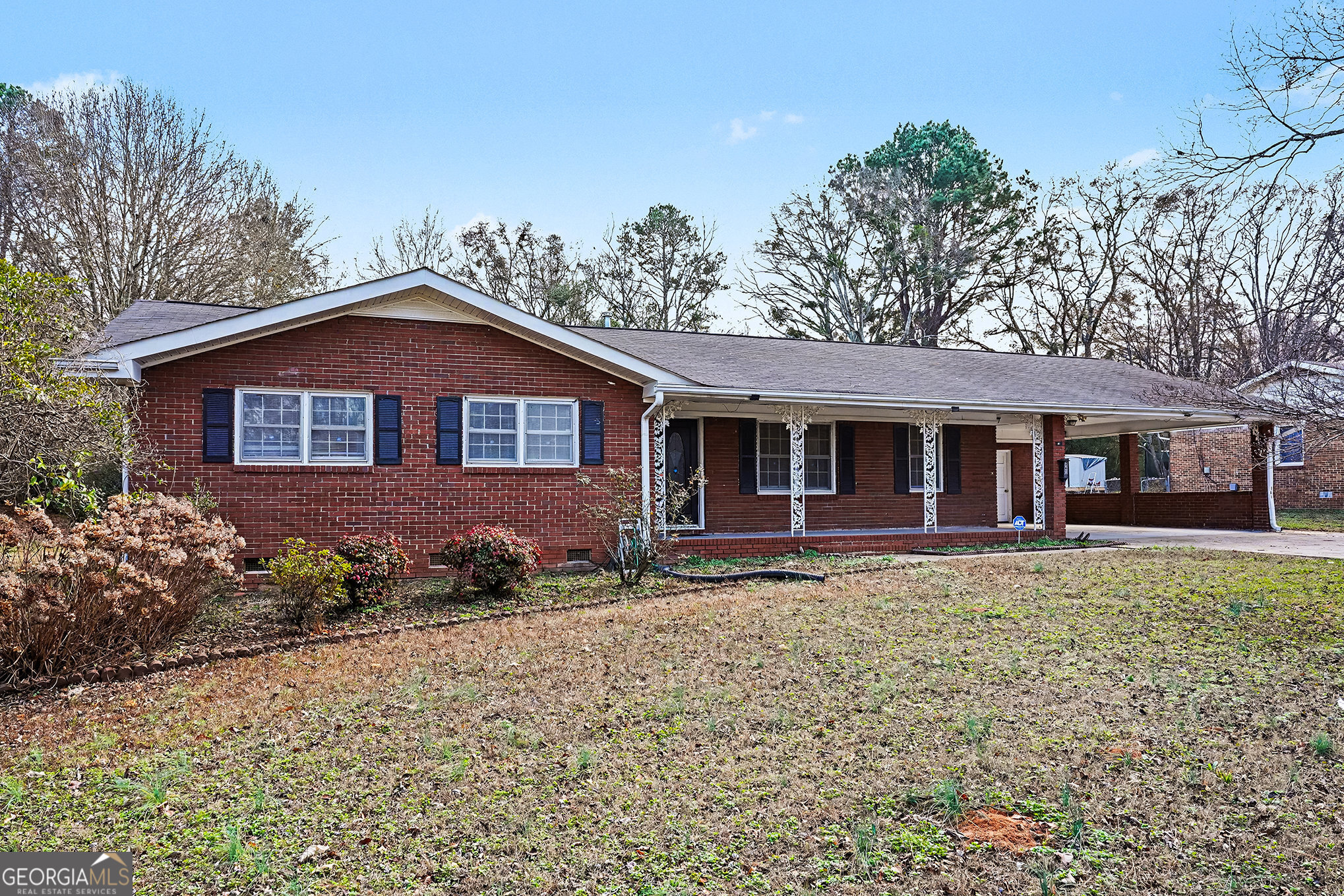 141 Grove Road Locust Grove, GA 30248 - Photo 2 of 27 front view of a house with a yard