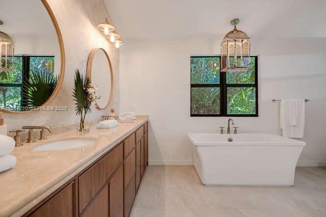 2330 Overbrook Street Coconut Grove, FL 33133 - Photo 59 of 99 a bathroom with a double vanity sink and a window