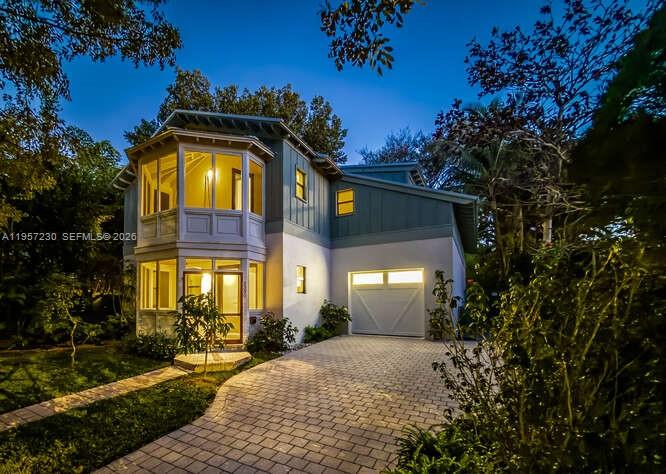2330 Overbrook Street Coconut Grove, FL 33133 - Photo 70 of 99 a front view of a house with a yard