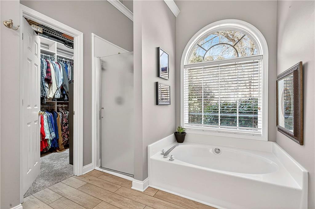 58 Legend Drive Villa Rica, GA 30180 - Photo 16 of 27 a view of entryway with a tub and glass door