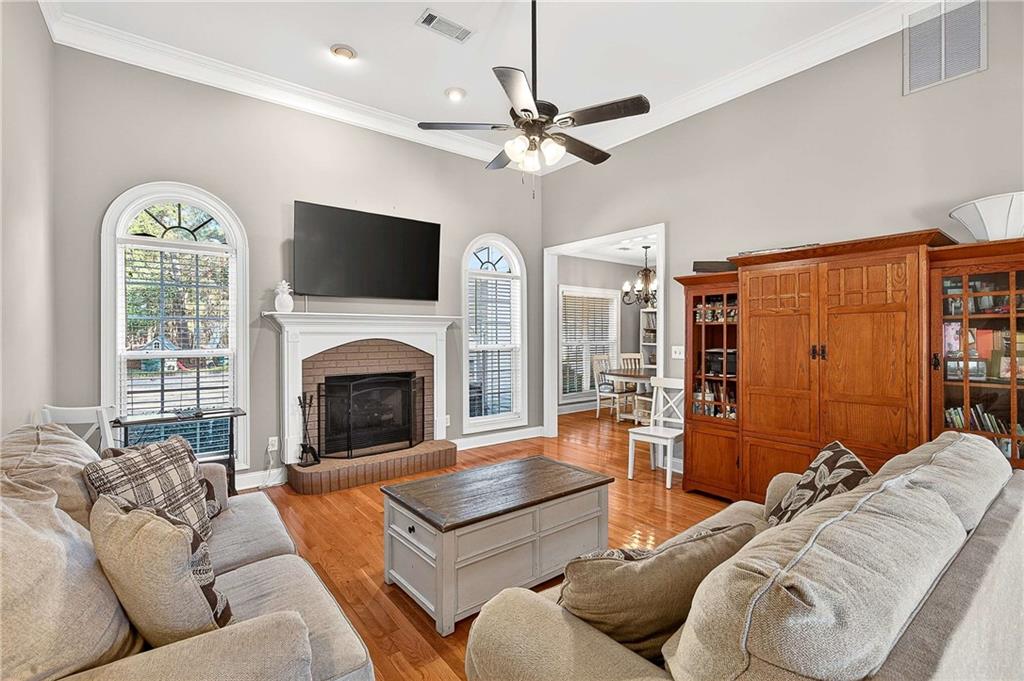 58 Legend Drive Villa Rica, GA 30180 - Photo 7 of 27 a living room with furniture fireplace and a flat screen tv