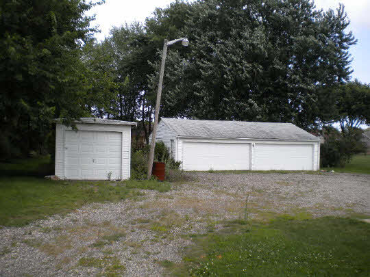 362 North Appleton Road Belvidere, IL 61008 - Photo 2 of 7 a view of a tiny house with a yard and large tree