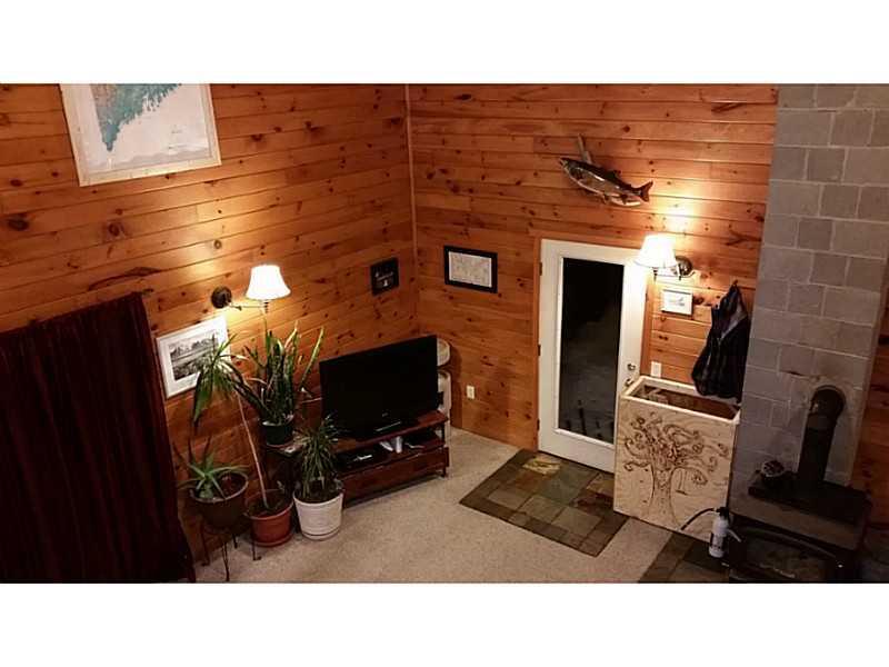 359 N Road Newburgh, ME 04444 - Photo 6 of 31 Living Room. 2 doors to the wrap...