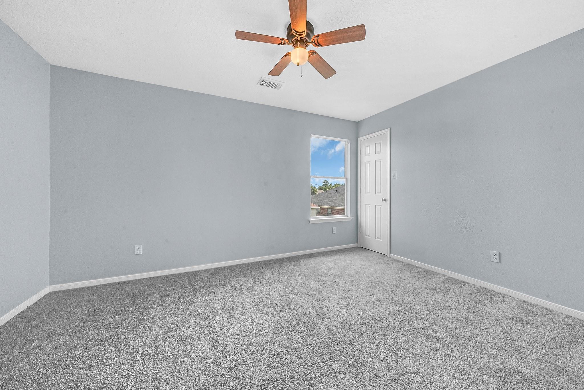 4238 Tree Moss Place Humble, TX 77346 - Photo 22 of 30 Bedroom 2 upstairs