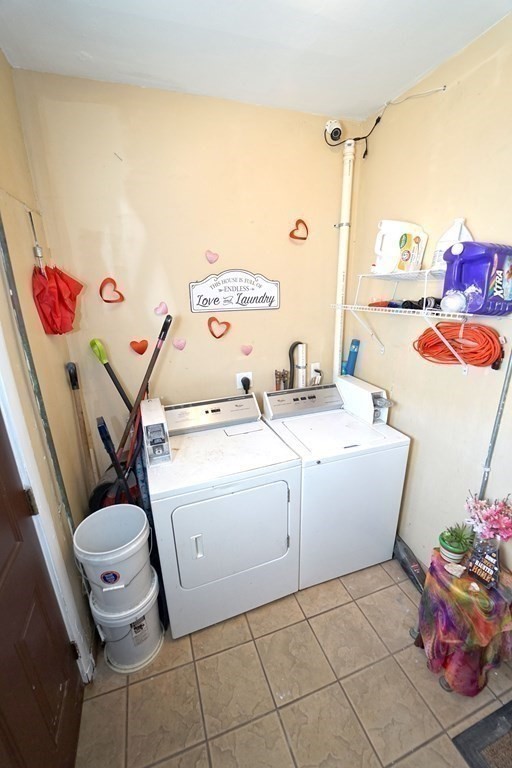 22 Coral Street Fall River, MA 02721 - Photo 12 of 23 a room with storage and utility