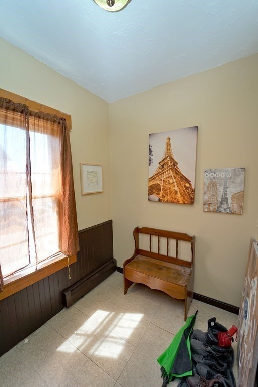 22 Coral Street Fall River, MA 02721 - Photo 13 of 23 a bedroom with furniture and a window