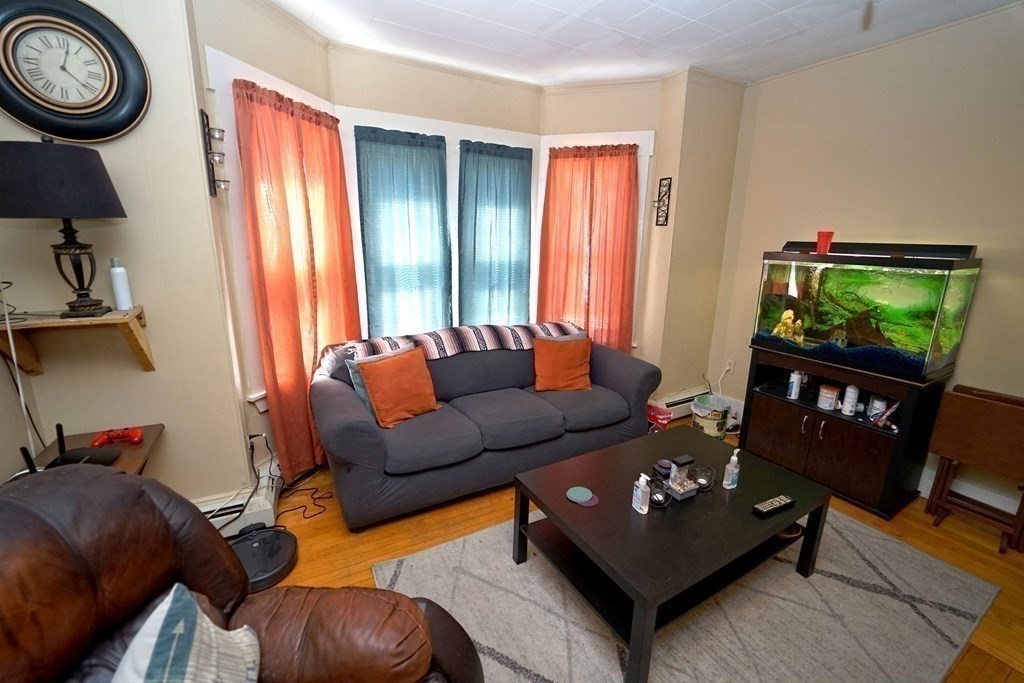 22 Coral Street Fall River, MA 02721 - Photo 14 of 23 a living room with furniture and a window