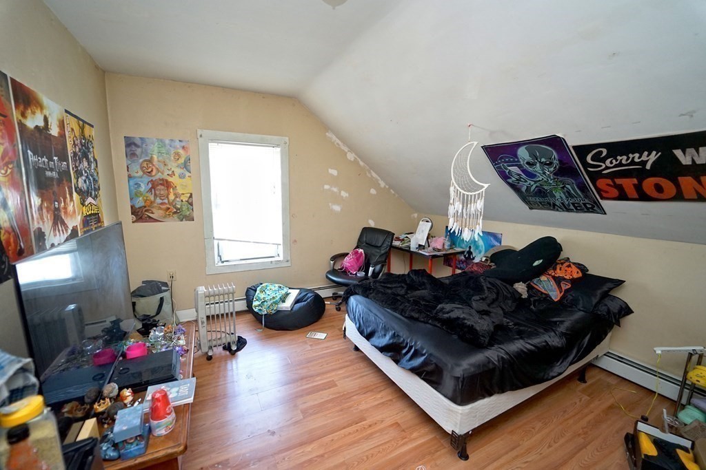 22 Coral Street Fall River, MA 02721 - Photo 20 of 23 a living room with furniture and a gym equipment