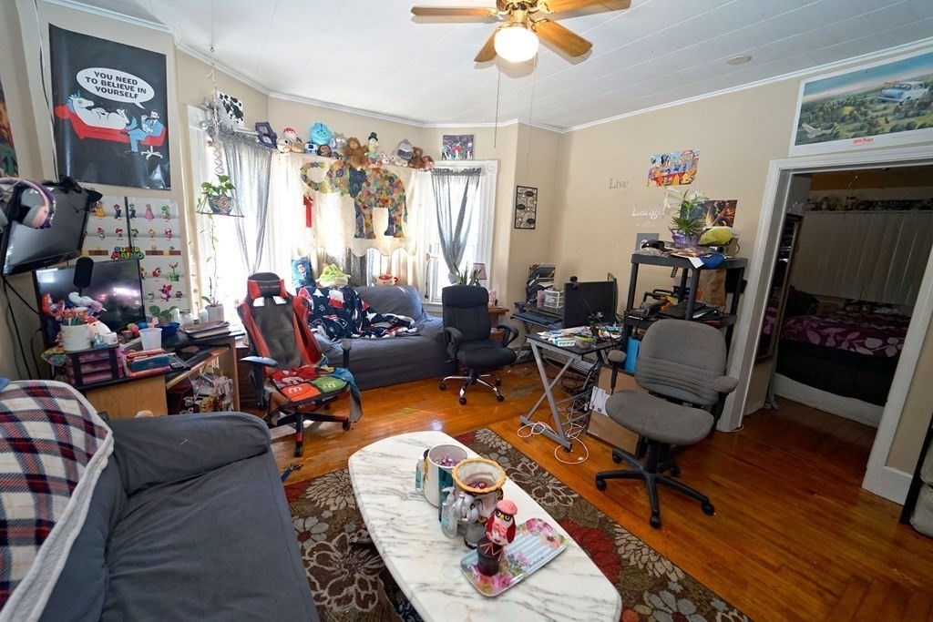 22 Coral Street Fall River, MA 02721 - Photo 7 of 23 a living room with furniture a rug and a window