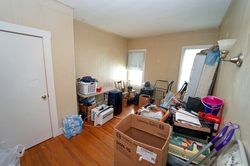 22 Coral Street Fall River, MA 02721 - Photo 10 of 23 a room with furniture or couch and a potted plant