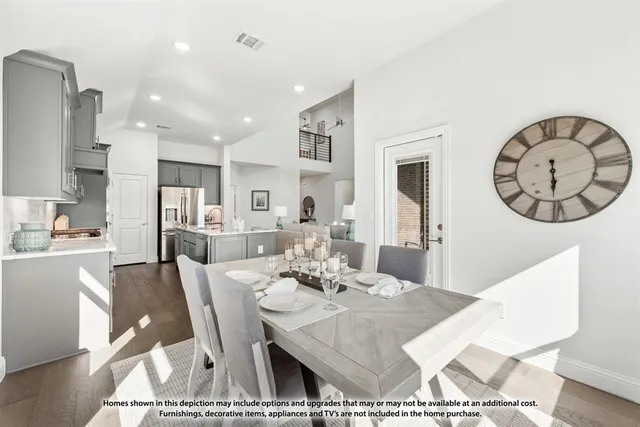 a large kitchen with stainless steel appliances kitchen island granite countertop a sink and cabinets