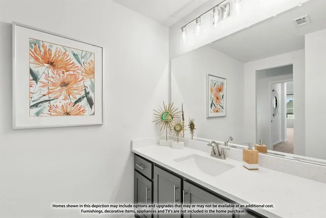 a picture of a bathroom with a sink