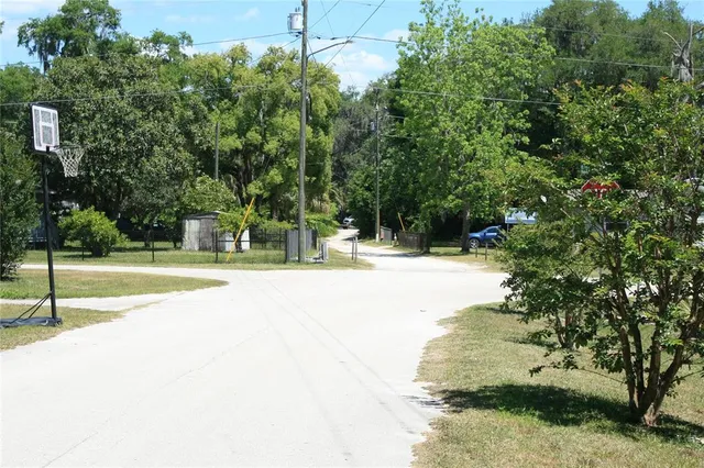 a view of swimming pool with a garden