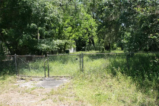 a view of lake with green space