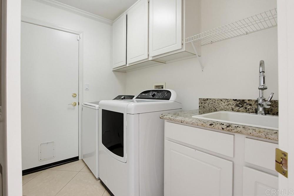 672 Inverlochy Drive Fallbrook, CA 92028 - Photo 52 of 75 a utility room with dryer and washer