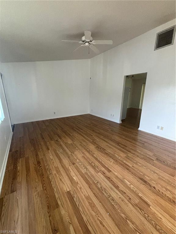 5386 16th Place Southwest, Unit F4 Naples, FL 34116 - Photo 4 of 11 wooden floor in a room