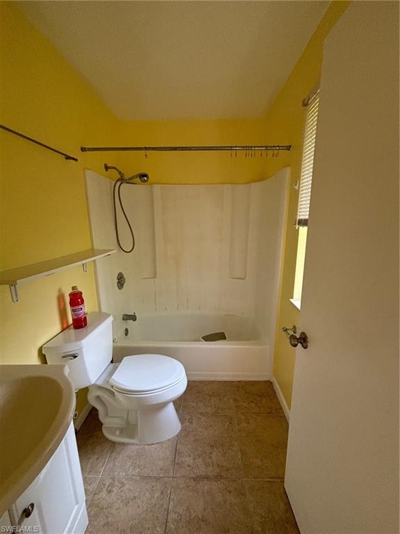 5386 16th Place Southwest, Unit F4 Naples, FL 34116 - Photo 8 of 11 a bathroom with a sink and a toilet