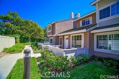 31 Christamon South Irvine, CA 92620 - Photo 1 of 1 a front view of house and yard with green space