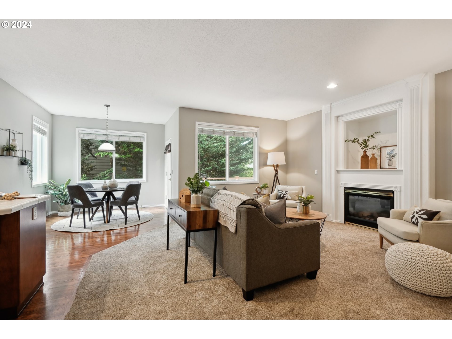 9267 Southwest 83rd Place Portland, OR 97223 - Photo 15 of 44 a living room with furniture and a fireplace