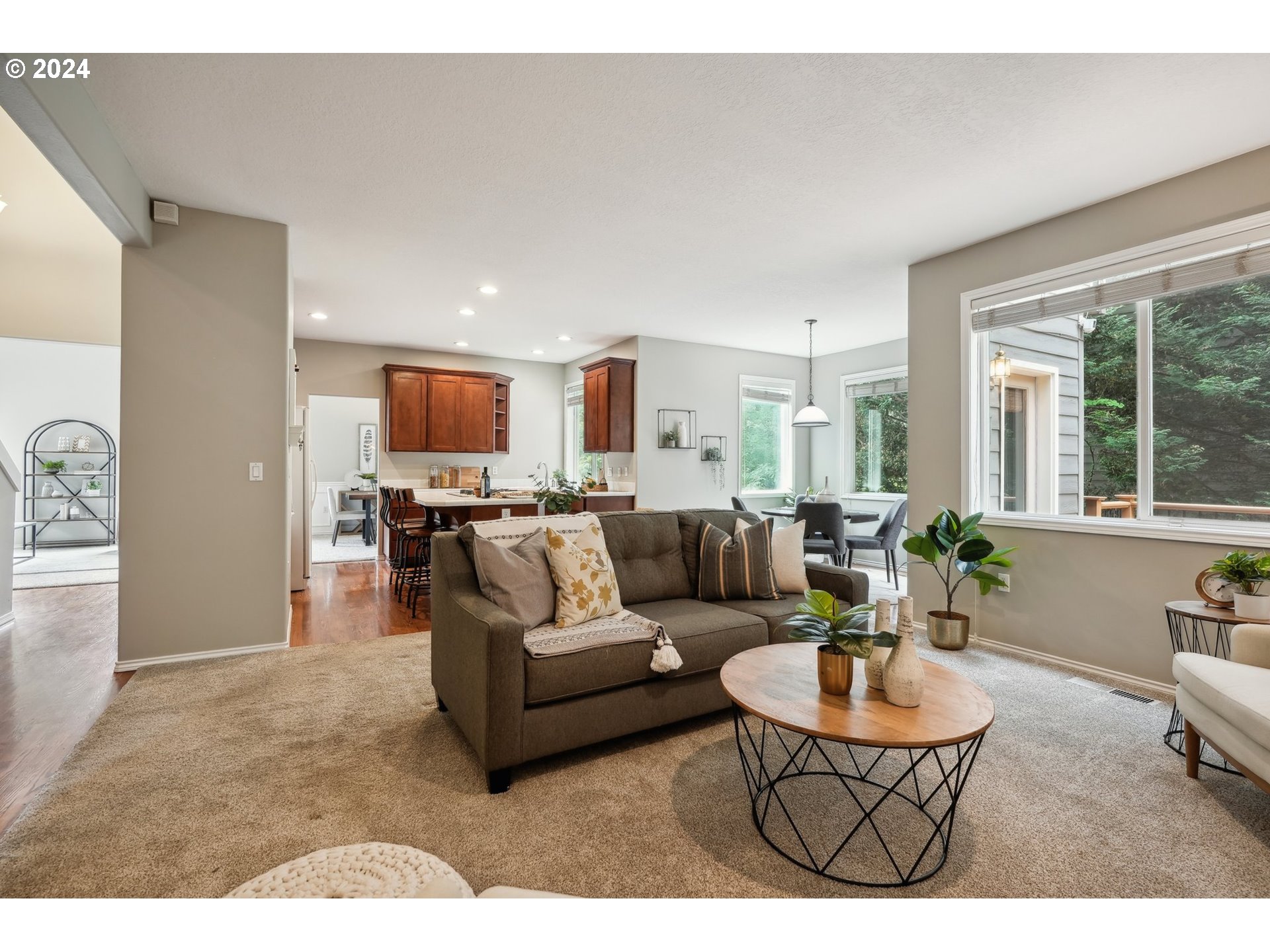 9267 Southwest 83rd Place Portland, OR 97223 - Photo 18 of 44 a living room with furniture and a large window