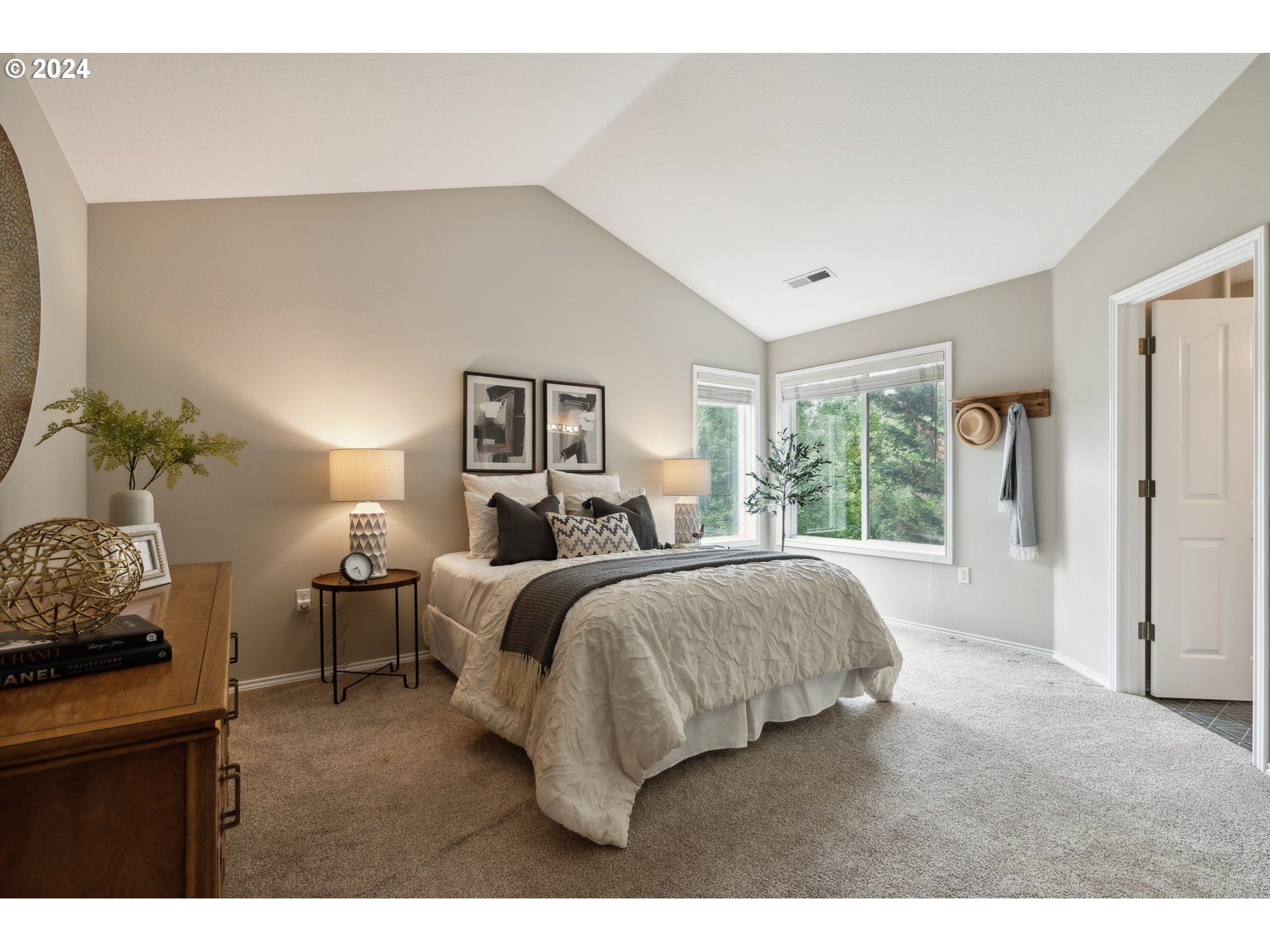 9267 Southwest 83rd Place Portland, OR 97223 - Photo 22 of 44 a bed room with a bed and a window