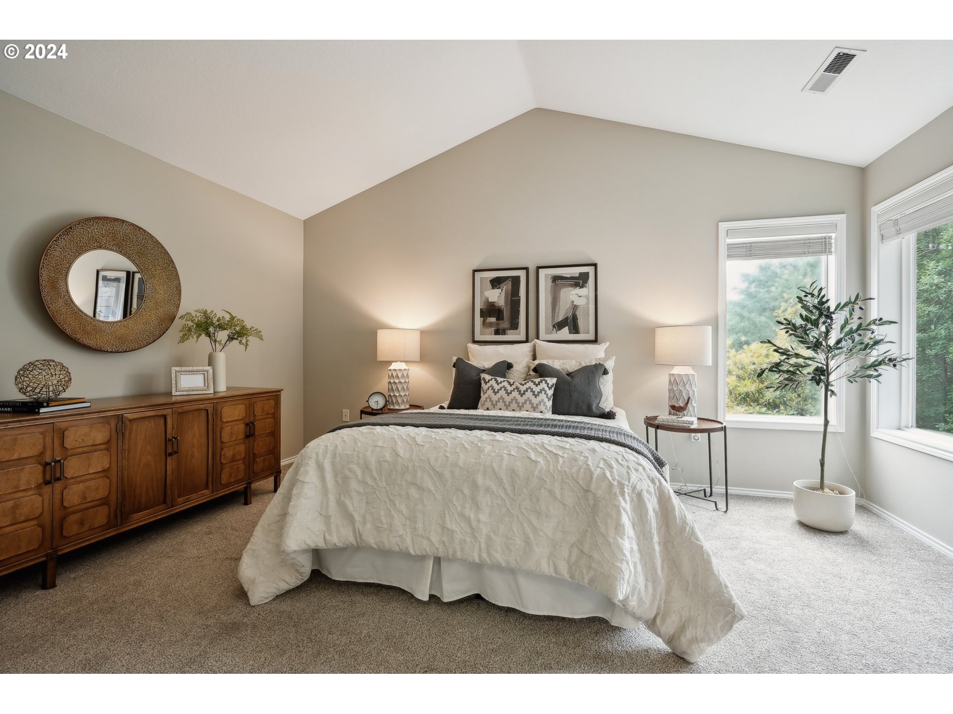 9267 Southwest 83rd Place Portland, OR 97223 - Photo 23 of 44 a bed room with a bed and potted plant