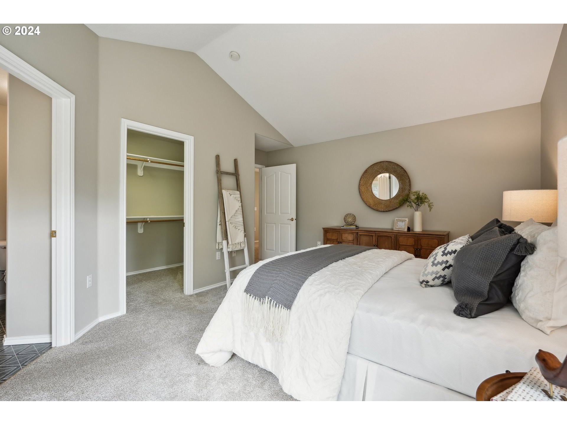 9267 Southwest 83rd Place Portland, OR 97223 - Photo 25 of 44 a bedroom with a bed and closet